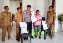 Bhabinkamtibmas Polsek Lamala Kawal Distribusi Bantuan 501 Karung Beras Warga Nipa