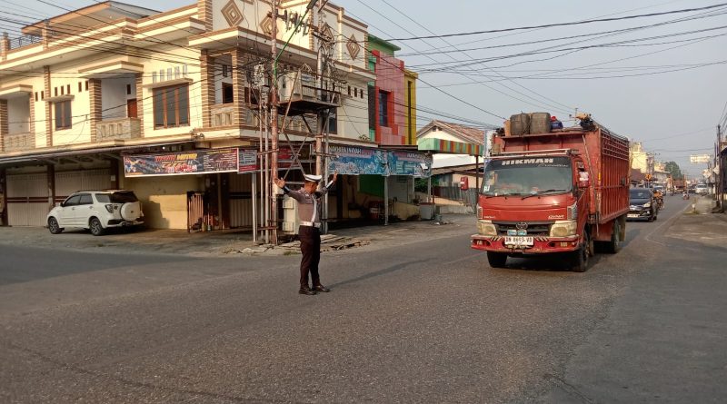 Tingkatkan Kesadaran Berkendara, Sat Lantas Polres Touna Gelar Strong Point Pagi di Titik Rawan